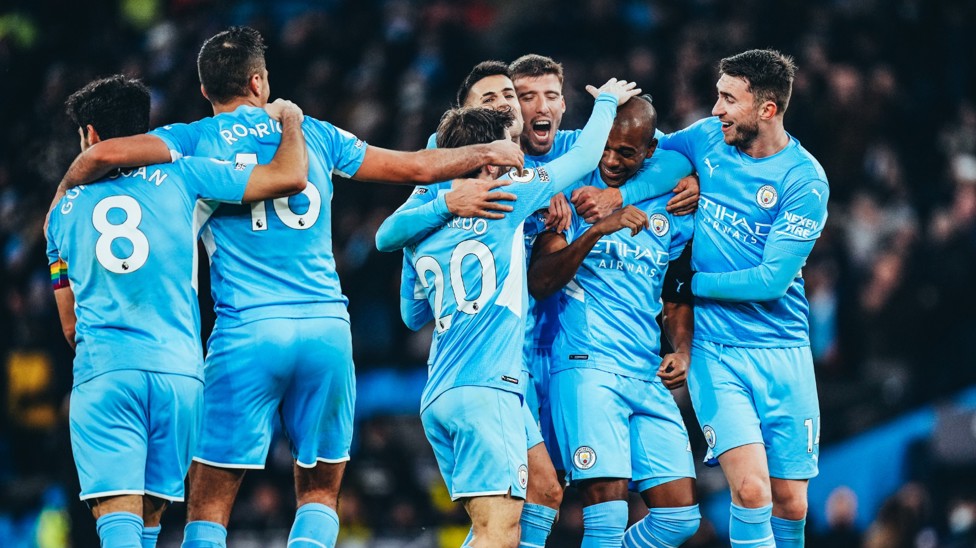ALL SMILES : Fernandinho feels the love after scoring a late second goal.
