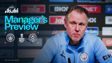 A blurred image of a person at a press conference for a Manager's Preview event. The match is between Manchester City and Sheffield United in the Adobe WFA Cup on Friday, 20 February 2026.