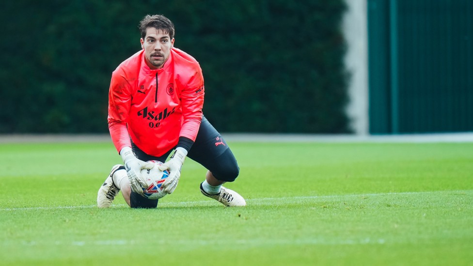 SAFE HANDS  : Stefan Ortega Moreno keeps the ball in his grasp.