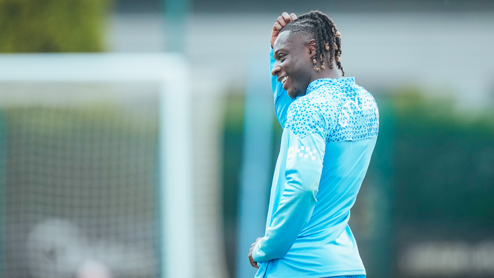 SMILING SIGNING : Jeremy Doku takes a break from the rigours of training