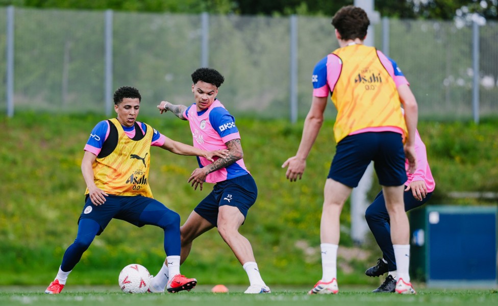 ACTION STATIONS: Rico Lewis and Nico O'Reilly contest possession.