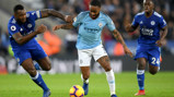 CENTRE OF ATTENTION: Raheem Sterling takes on Wes Morgan