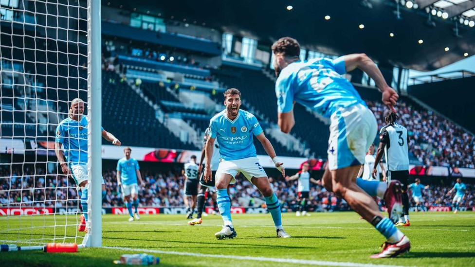 WHEELING AWAY : Josko runs off to celebrate with team-mates after his second at Craven Cottage.