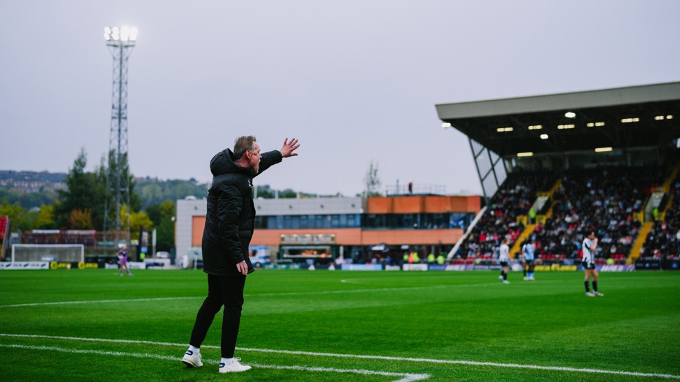 INSTRUCTING FROM THE SIDELINES: Andrée Jeglertz shouting from the dugout