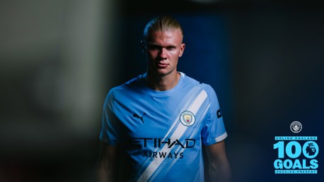 Image of an unidentified person in a Manchester City kit with the text 'Erling Haaland 100 Goals 2022/23-Present' in the corner.
