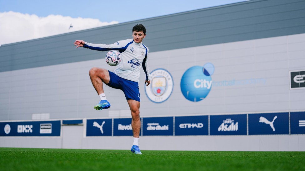 TOUCH : Abdukodir Khusanov in possession. 