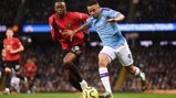 HARD AT IT: Gabriel Jesus tries to free himself of Aaron Wan-Bissaka's attentions.