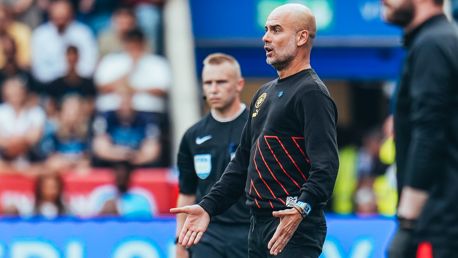 THE BOSS: Guardiola watches on.