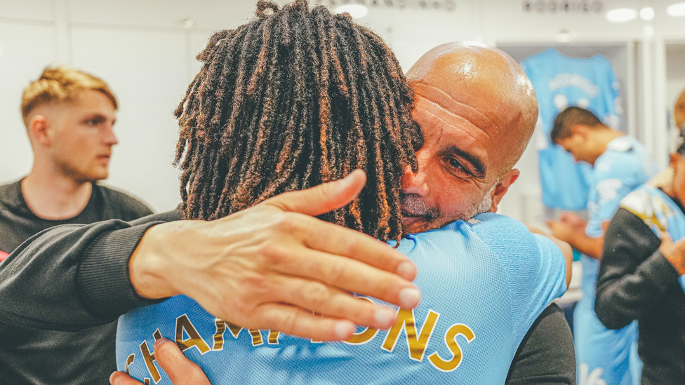 THANK YOU : Nathan Ake is the latest player to get a hug from Pep