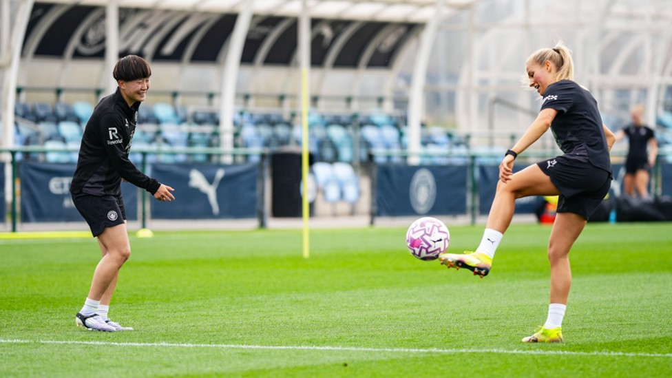 PASS MASTERS: Aoba Fujino and Tara O'Hanlon during Monday's session.