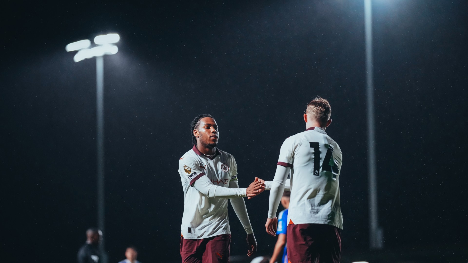 TEAM-MATES : Micah Hamilton and Kian Breckin give each other an encouraging high five.