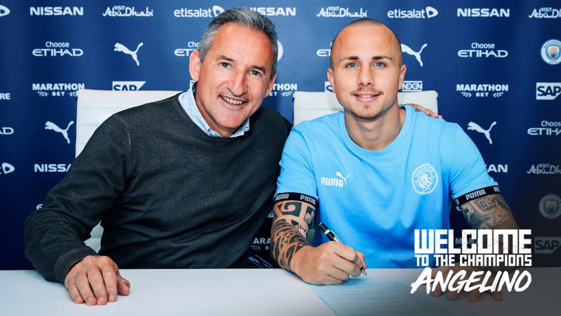 HE'S BACK: Putting pen to paper to seal his return!