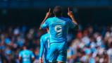 PRAYERS ANSWERED: Jesus celebrates his goal.