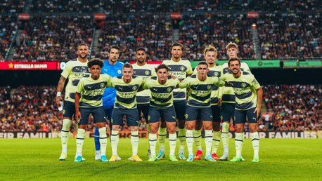 STARTING XI: The starters strike a pose.