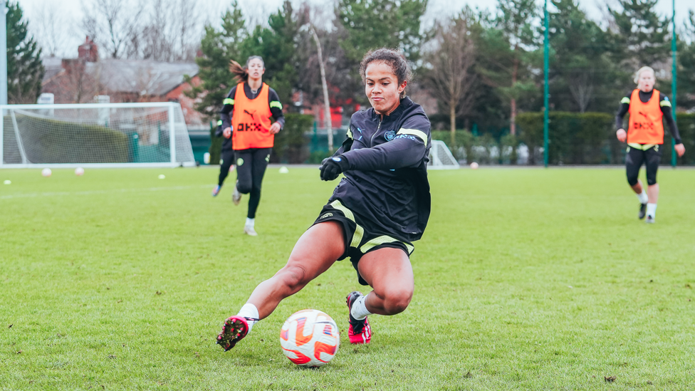 SLIDE RULE : Mary Fowler stretches for the ball