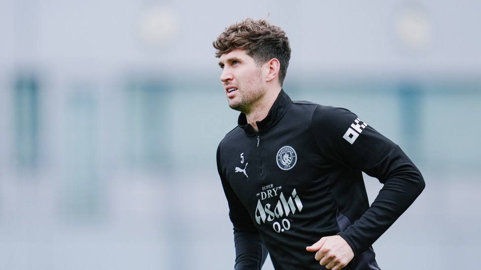 DEFENSIVE DUTIES : John Stones limbers up