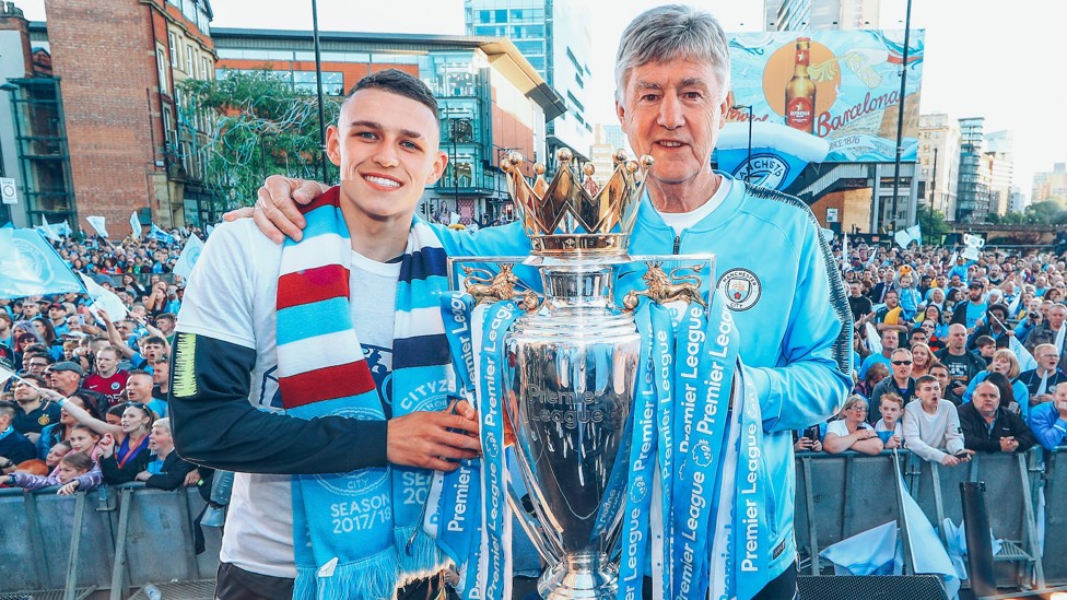 LANDMARK MOMENT : Celebrating at the Champions parade after City completed a  clean sweep of domestic trophies.