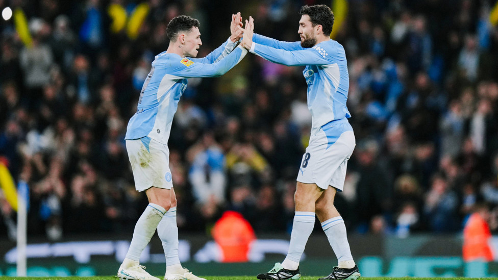 SCORER AND PROVIDER : Foden and Kovačić celebrate.