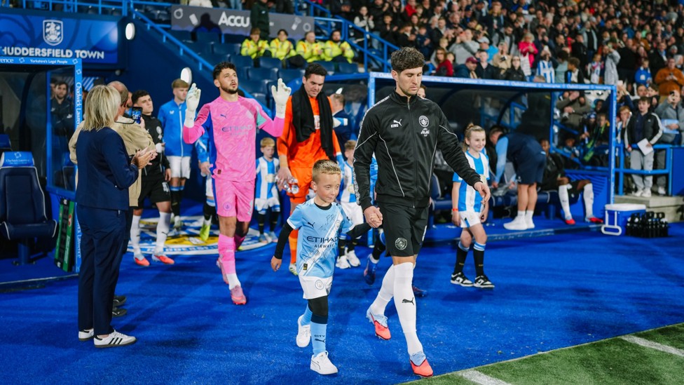 UNDER THE LIGHTS: John Stones leads City out in Yorkshire