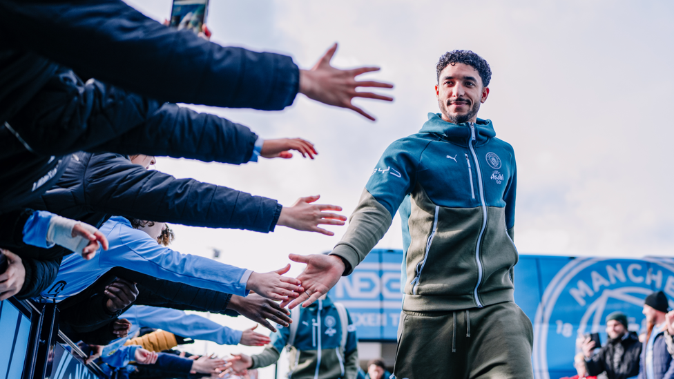 HIGH FIVES : Marmoush greets the fans on the way into the Etihad.
