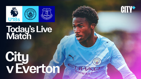 Promotional image for a live match between Manchester City's U18 team and Everton's U18 team, featuring City Plus broadcast information with logos and a blurred-out player wearing the Manchester City kit.