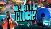 Image featuring the text 'Against the Clock! Rainmakers Episode 2' with various blurred individuals and scenes of a construction site and large blue structure. Logos of Xylem and Manchester City are present.