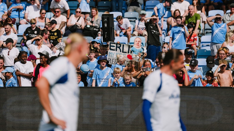 CITY ARE BACK: The players go through their paces in front of the excited City fans.