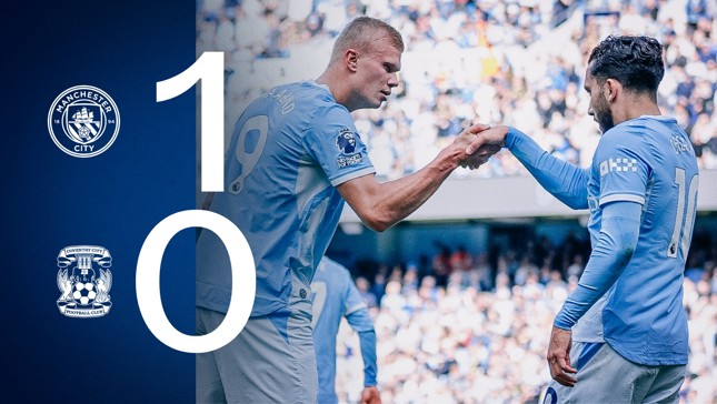 Manchester City defeats Coventry City 1-0, featuring a handshake celebration between two players wearing the Manchester City kit.