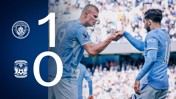 Manchester City defeats Coventry City 1-0, featuring a handshake celebration between two players wearing the Manchester City kit.