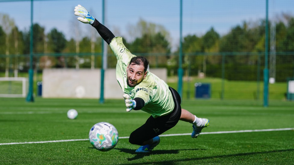 AT FULL STRETCH: Gianluigi Donnarumma goes the extra mile.