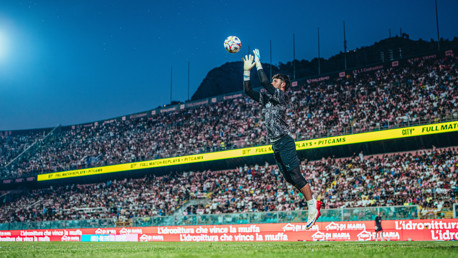 JUMPING JAMES: Safe hands in the pre-match warm up.