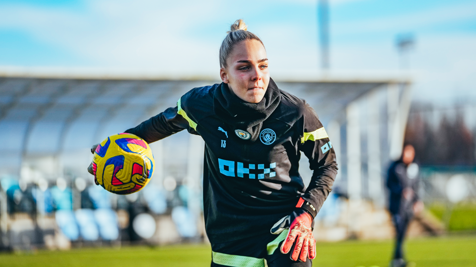 SAFE HANDS : Ellie Roebuck looks to throw the ball out 