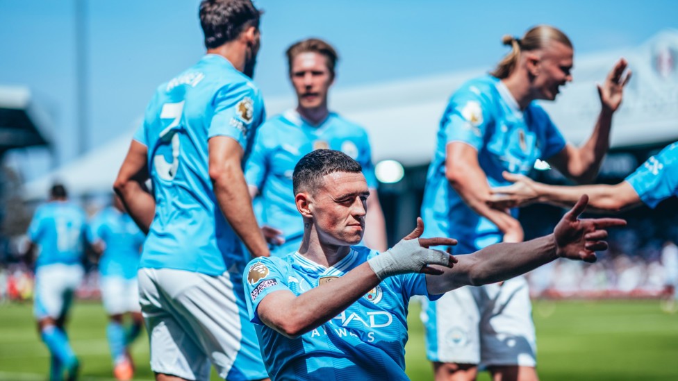 SHARP SHOOTER  : Foden doubles our lead and celebrates in front of the City fans.