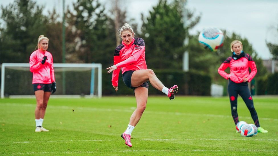 SHOOTING DRILLS : Laura Coombs fires at goal
