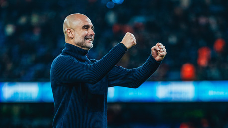 THE BOSS: Celebrates on the touchline.
