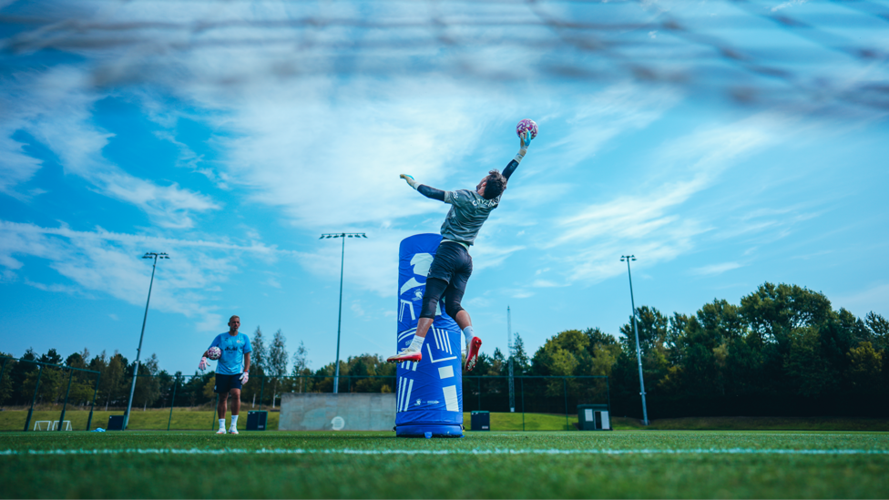 REACH FOR THE STARS : Trafford leaps into the air