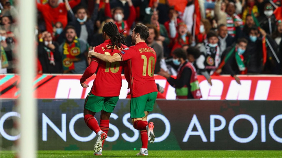 EARLY STRIKE: Bernardo Silva celebrates with Renato Sanches