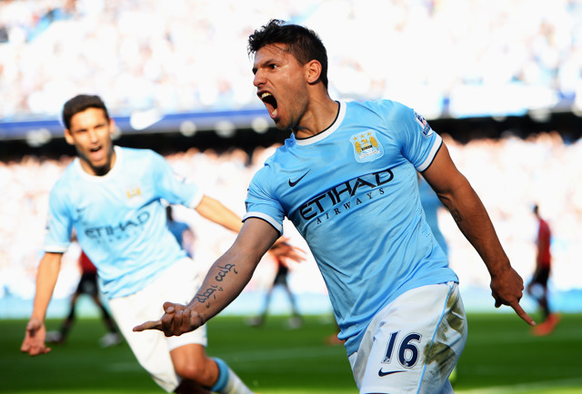 Sergio Aguero celebrates scoring against Manchester United