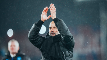 THE BOSS: Applauds the travelling fans.