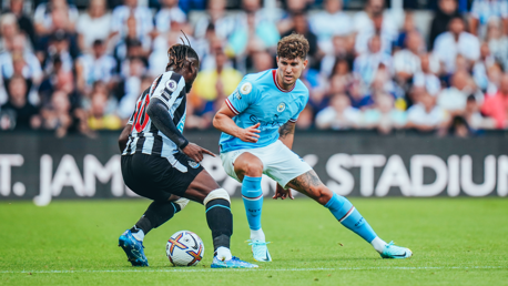 STICKY STONES: John keeps touch tight to Saint-Maximin.