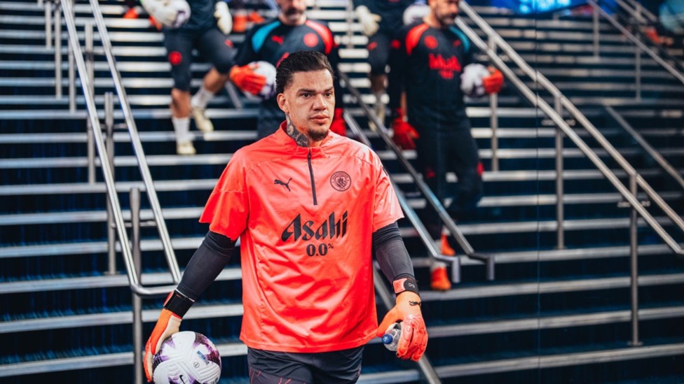 READY EDDIE: Ederson makes his way out onto the turf