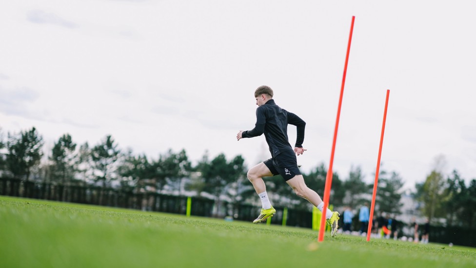 STRETCHING THE LEGS : Rhys Thomas making the run. 