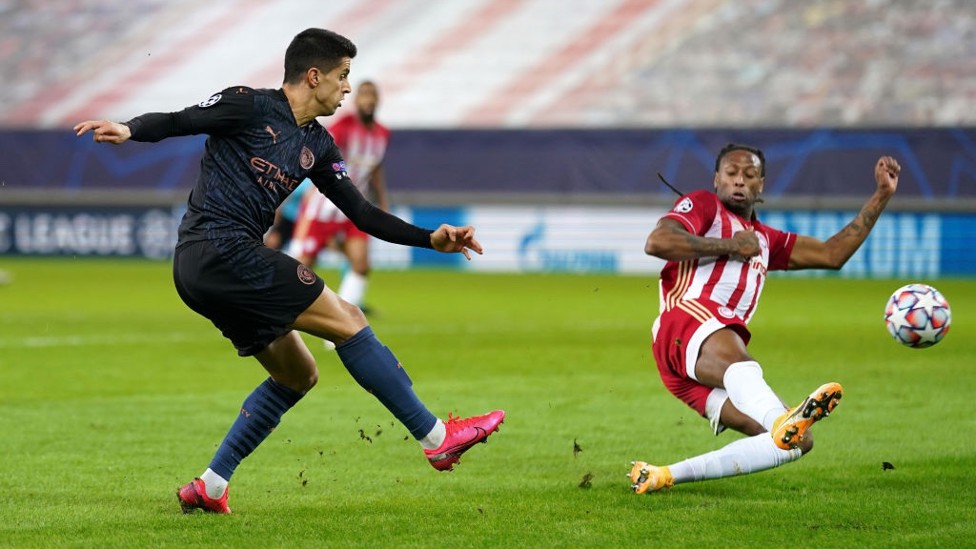 ON THE FRONT FOOT : Cancelo looks to set up a second goal after the interval.