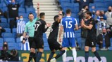 RED CARD: Cancelo is sent off in the tenth minute after tangling with Welbeck.
