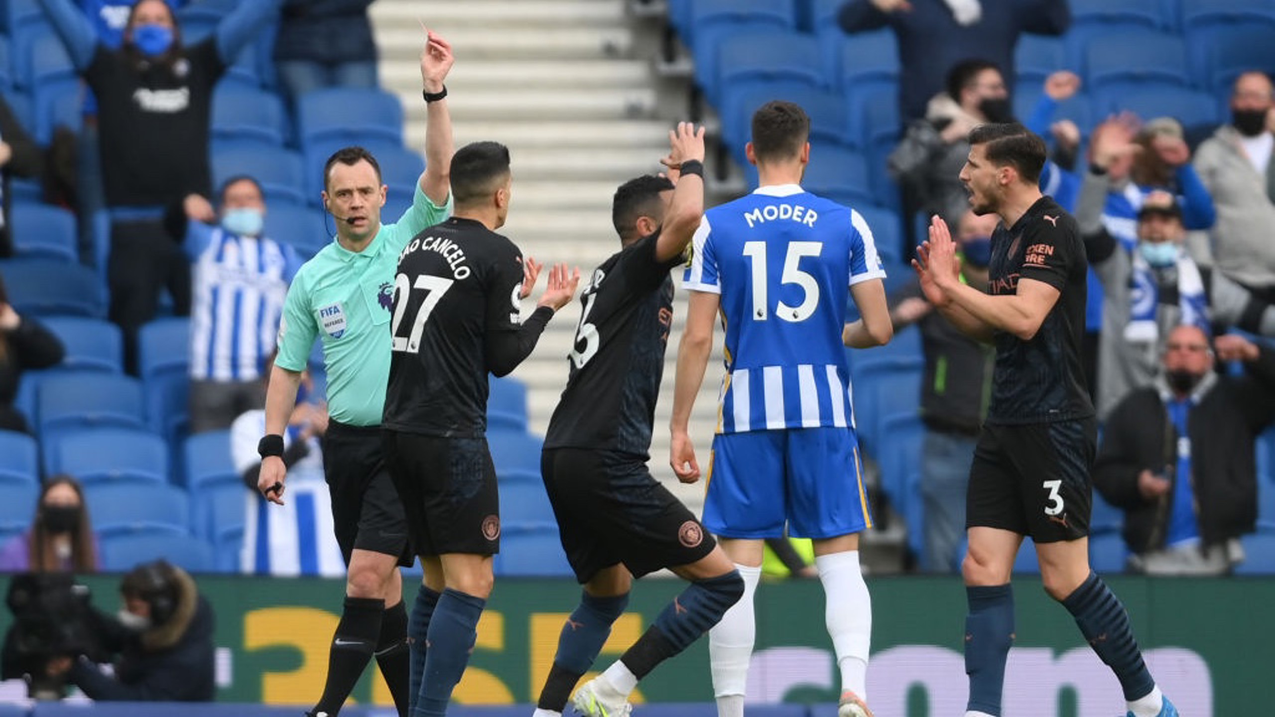 RED CARD: Cancelo is sent off in the tenth minute after tangling with Welbeck.