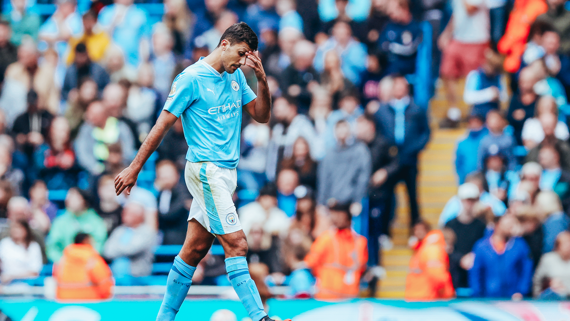 FLASHPOINT: Rodrigo walks off after his red card.