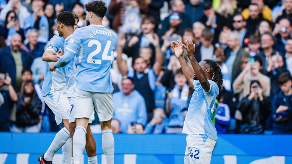 AWESOME ANTOINE : Celebrates.