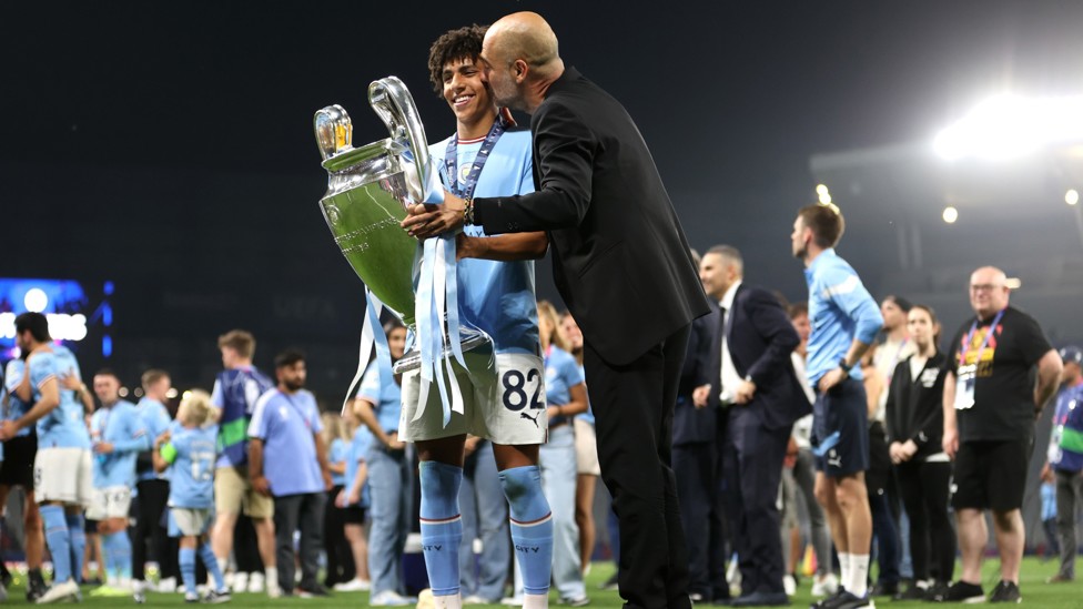 THANK YOU : Guardiola shows his appreciation to Lewis after City win the Champions League final in Istanbul.
