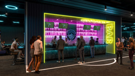 A vibrant sports bar with neon yellow and pink lighting. People are gathered at the bar watching multiple screens airing a sporting event. Manchester City logo is visible behind the bar.
