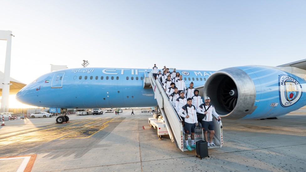 IN TOWN : City staff and players arrive in Saudi Arabia for the FIFA Club World Cup.